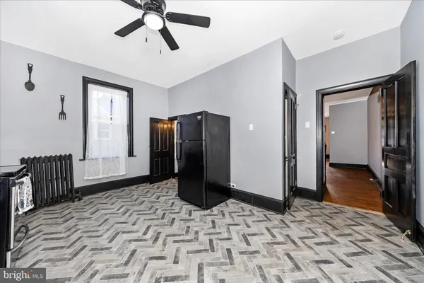 a view of a hallway with a chandelier