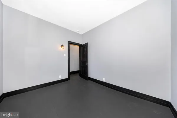 a view of a room with a hallway