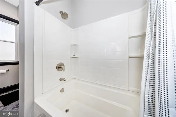 a bathroom with a bathtub