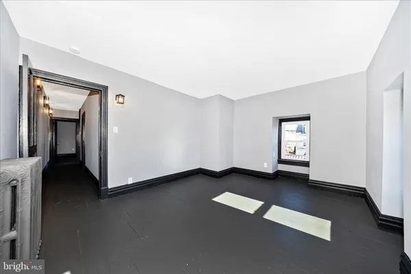 an empty room with a door