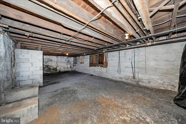 front view of a building with a garden