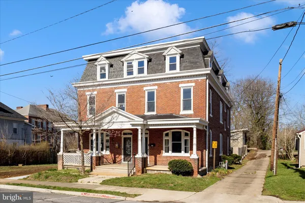 front view of a house with a patio