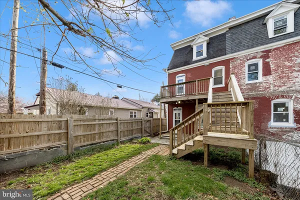 a view of porch with wooden floor and fence