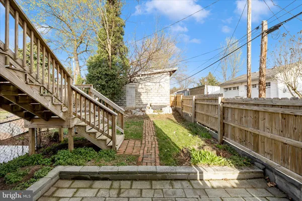 a view of a backyard of the house