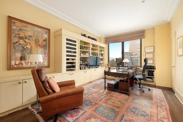 a living room with furniture or couch and a table