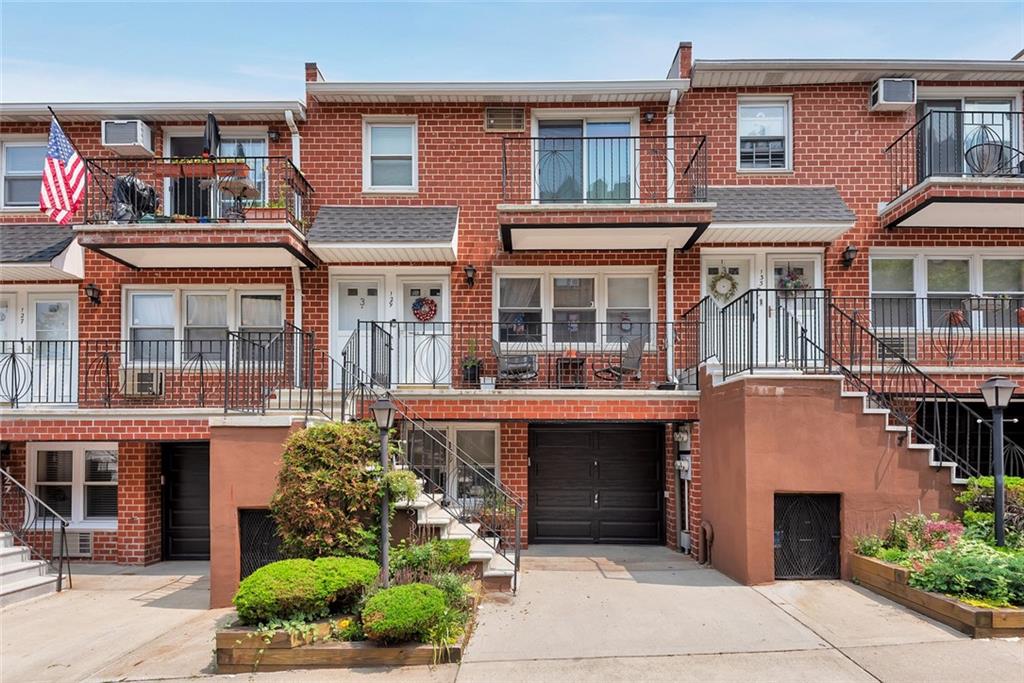 129 Bay Ridge Parkway, Unit 3 Brooklyn, NY 11209 - Photo 12 of 13 a front view of a house with a garden