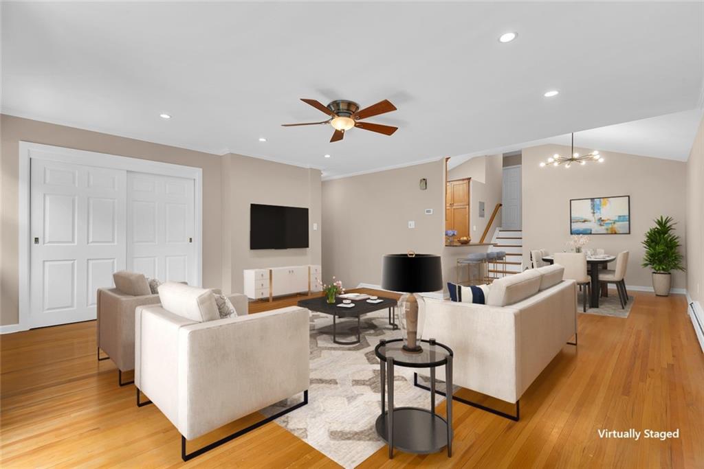 129 Bay Ridge Parkway, Unit 3 Brooklyn, NY 11209 - Photo 2 of 13 a living room with furniture and a flat screen tv
