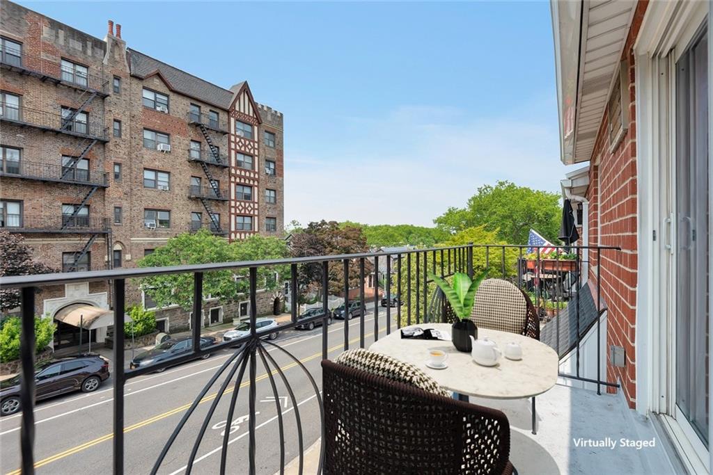 129 Bay Ridge Parkway, Unit 3 Brooklyn, NY 11209 - Photo 4 of 13 a view of a balcony with two chairs and a table