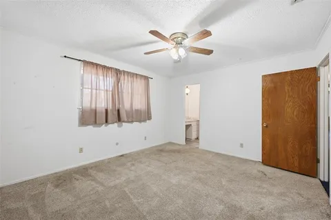 a view of an empty room with window