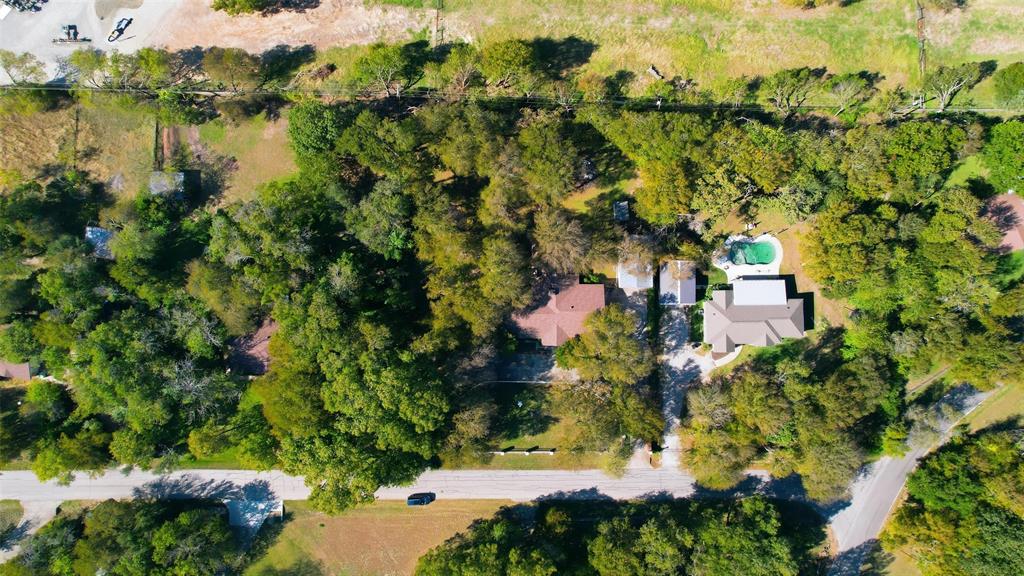 1508 Red Oak Circle Azle, TX 76020 - Photo 7 of 27 Numerous trees with shop and circle drive