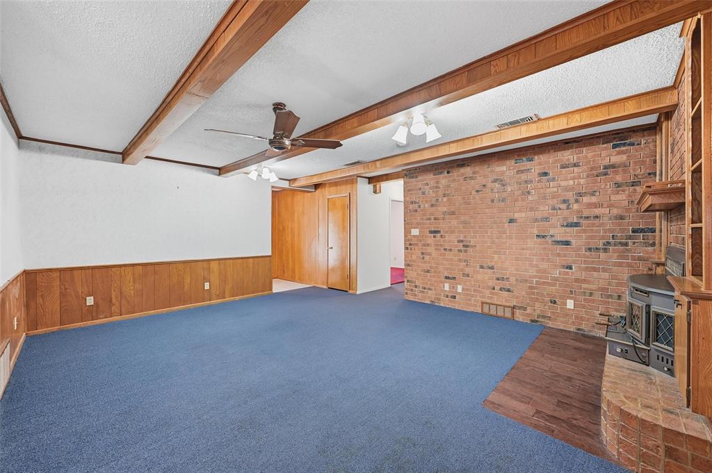 1508 Red Oak Circle Azle, TX 76020 - Photo 9 of 27 Open from the kitchen with fireplace insert
