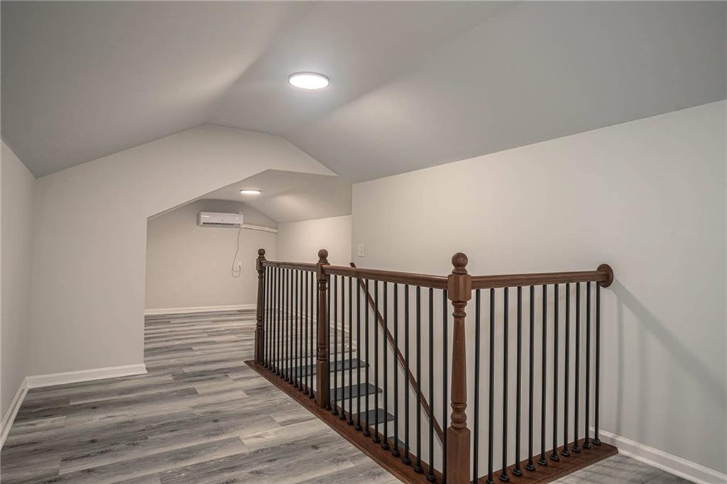 610 Glenforest Road Atlanta, GA 30328 - Photo 30 of 44 a view of hallway with stairs