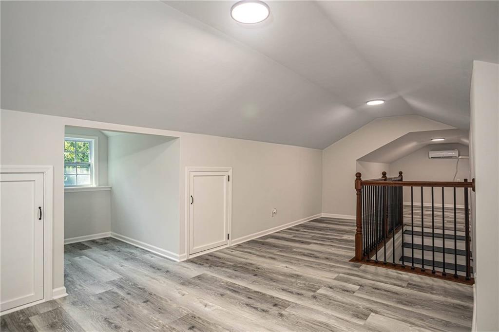 610 Glenforest Road Atlanta, GA 30328 - Photo 31 of 44 a view of a livingroom with wooden floor