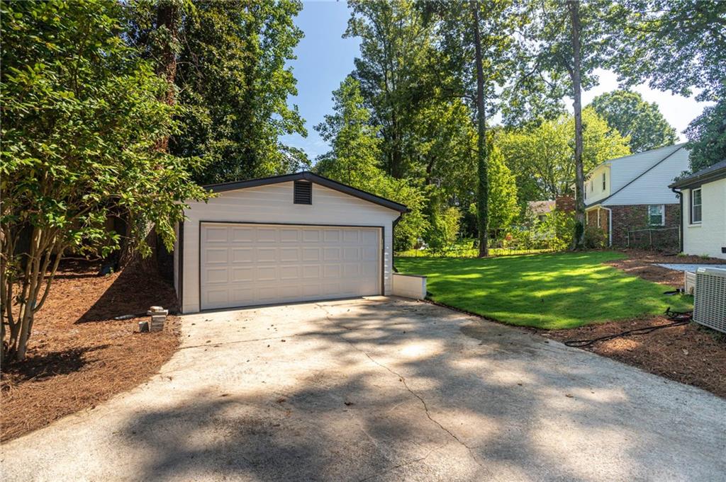 610 Glenforest Road Atlanta, GA 30328 - Photo 42 of 44 a house with yard in front of it
