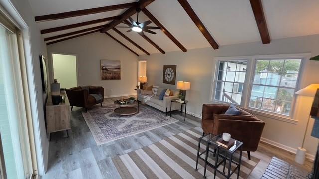 610 Glenforest Road Atlanta, GA 30328 - Photo 9 of 44 a living room with furniture a flat screen tv and wooden floor