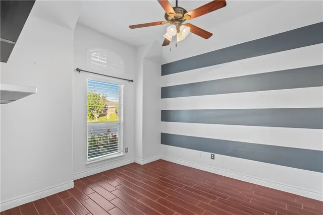 a view of a hallway view with staircase