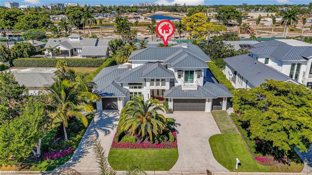 405 7th Avenue North Naples, FL 34102 - Photo 47 of 50 an aerial view of residential houses with outdoor space and trees