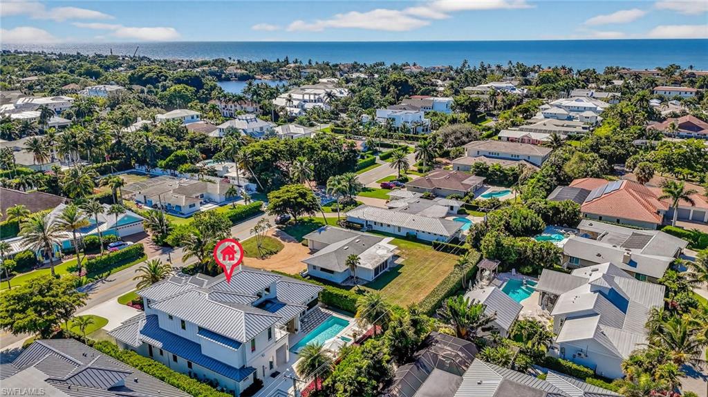 405 7th Avenue North Naples, FL 34102 - Photo 50 of 50 an aerial view of residential houses with outdoor space and ocean view