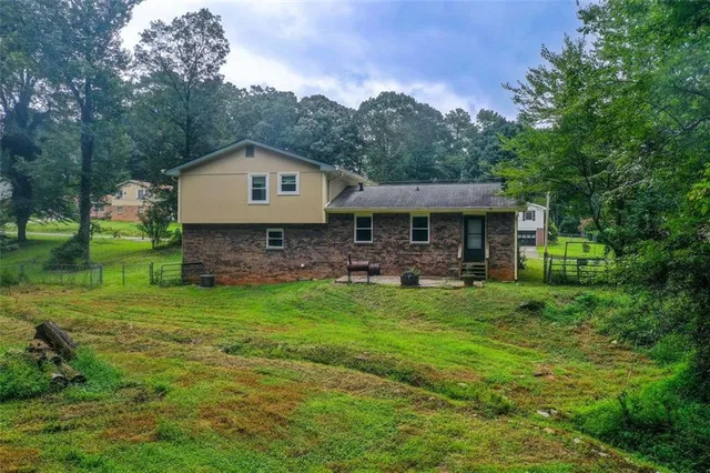a view of a lake with a yard