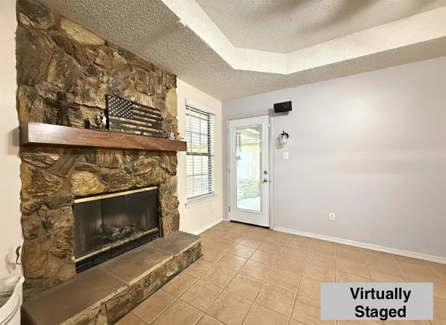 a kitchen view with a table and chairs in it