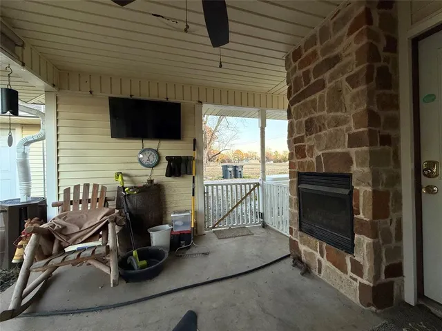 a view of a car park in front of a house