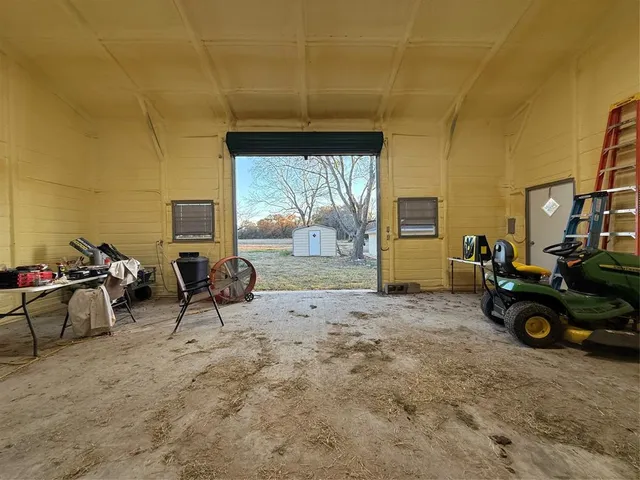 a view of a yard with trees
