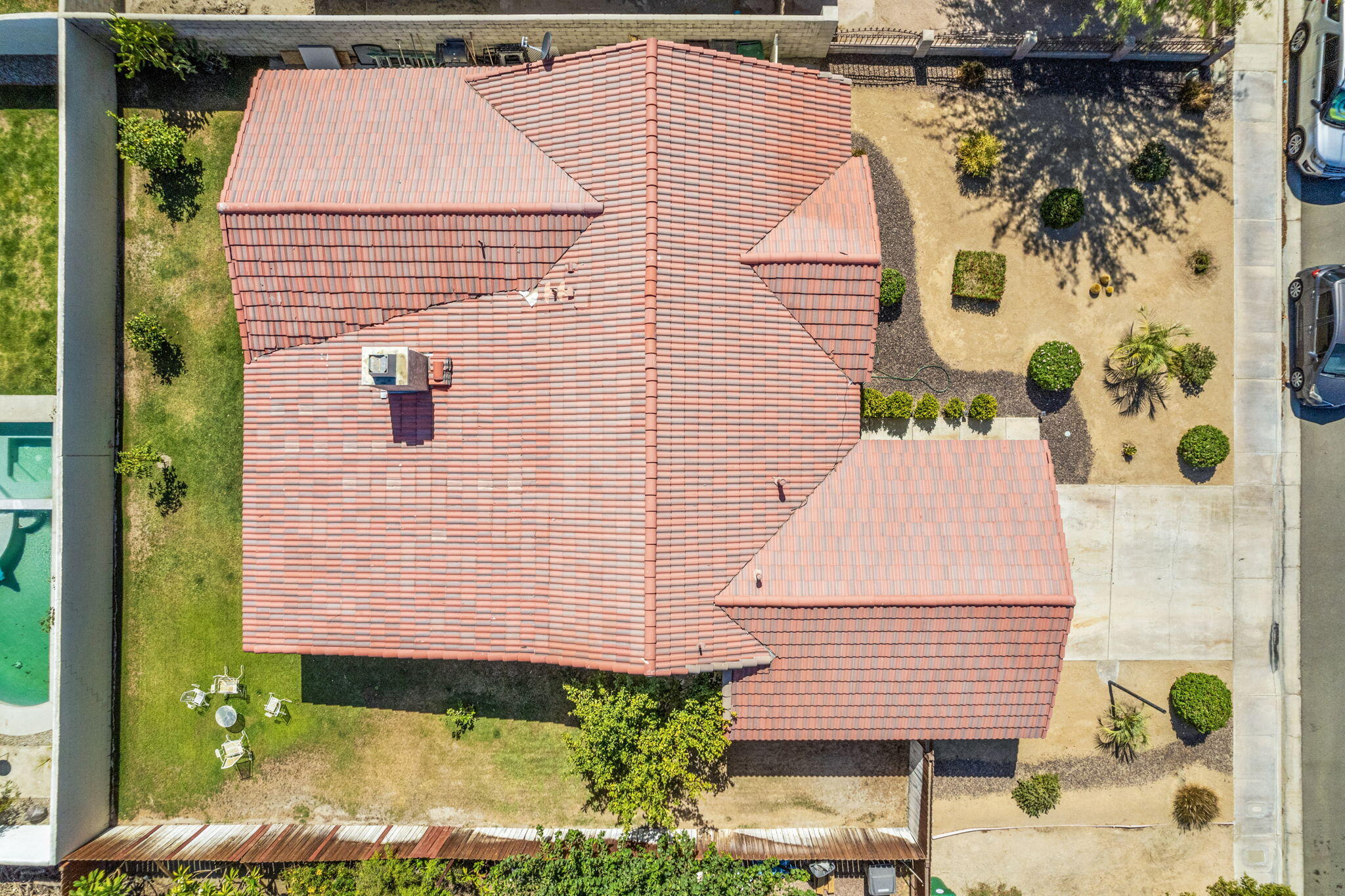 82445 Arlene Drive Indio, CA 92201 - Photo 17 of 18 a aerial view of a house with a yard and potted plants