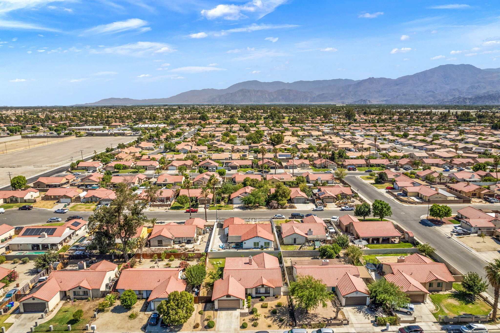 82445 Arlene Drive Indio, CA 92201 - Photo 18 of 18 an aerial view of residential houses with outdoor space