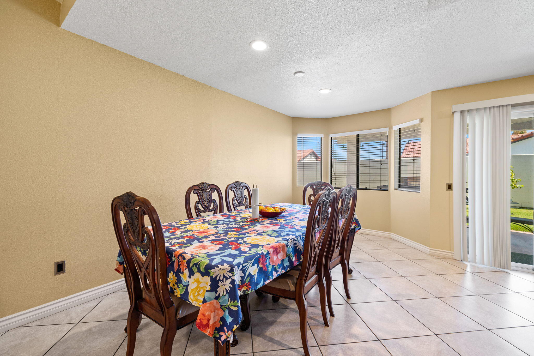 82445 Arlene Drive Indio, CA 92201 - Photo 7 of 18 a dining room with furniture and window