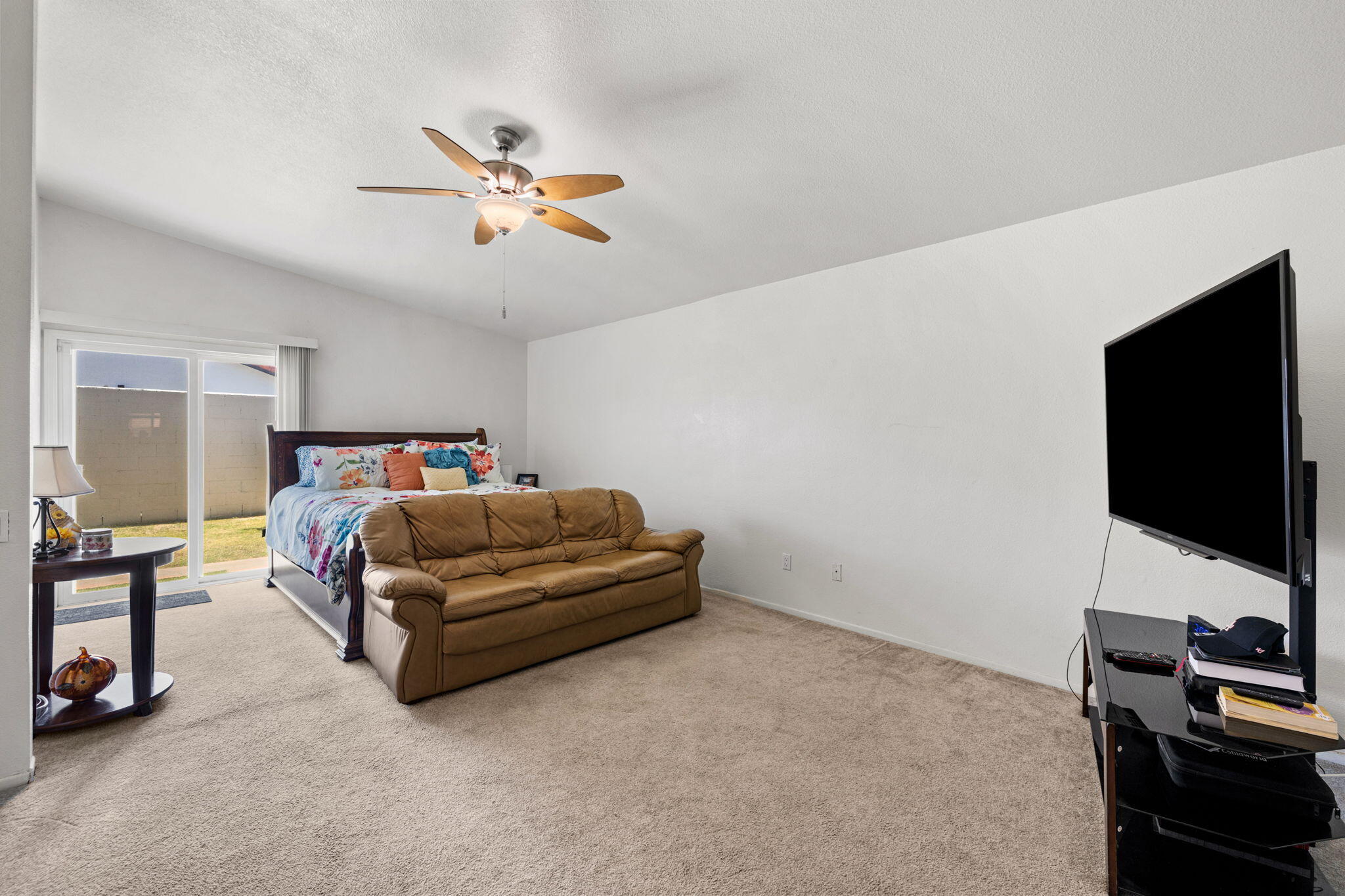82445 Arlene Drive Indio, CA 92201 - Photo 10 of 18 a bedroom with a bed and a flat screen tv