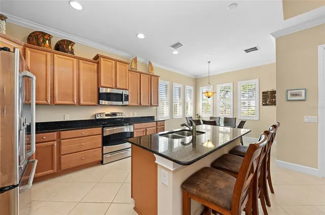 a view of a livingroom with furniture and a window