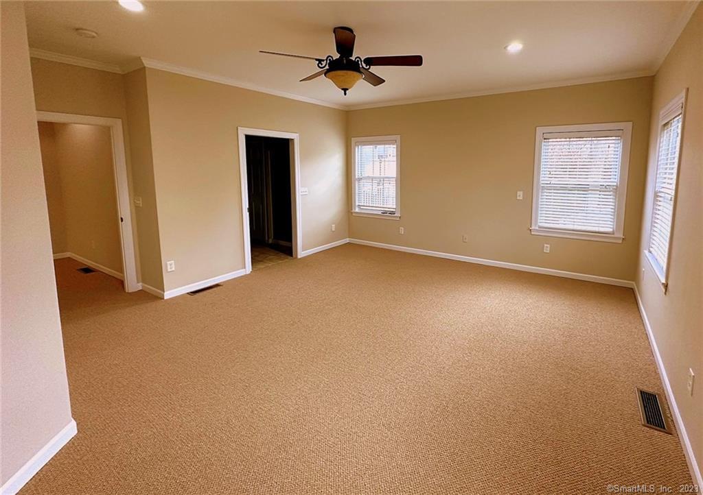 38 Canfield Drive Shelton, CT 06484 - Photo 16 of 29 a view of a livingroom with a ceiling fan and window