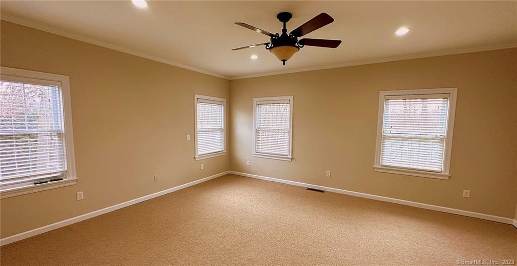 38 Canfield Drive Shelton, CT 06484 - Photo 17 of 29 a view of an empty room with a window