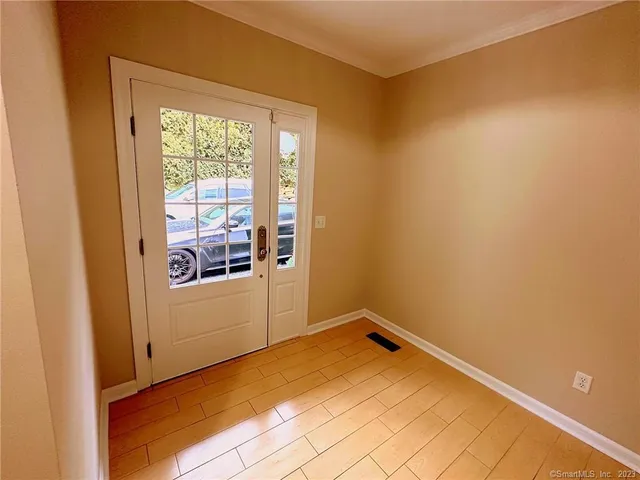 a view of a room with a window