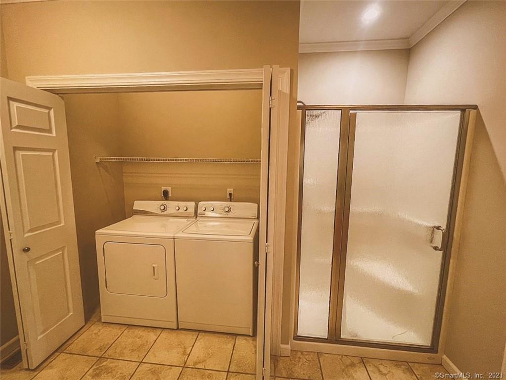 38 Canfield Drive Shelton, CT 06484 - Photo 22 of 29 a utility room with dryer and washer