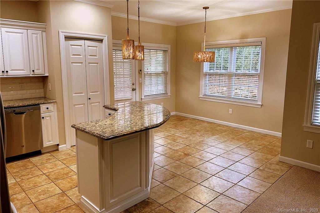 38 Canfield Drive Shelton, CT 06484 - Photo 6 of 29 a bathroom with a granite countertop sink and a mirror