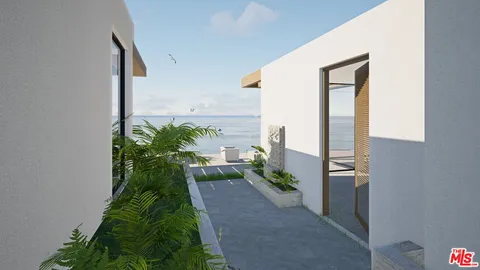 a view of a back yard from a corridor