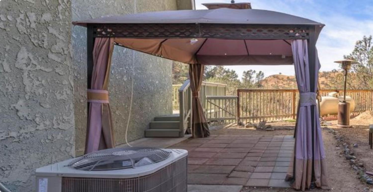 27817 Sky Harbour Road Friant, CA 93626 - Photo 8 of 36 a glass door with glass top table and chairs
