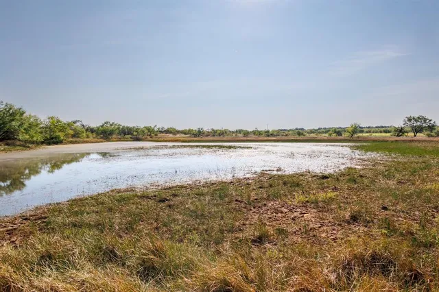 a view of an ocean with beach