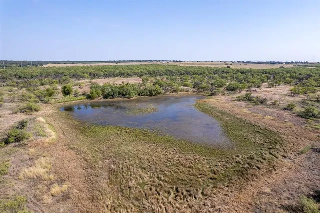 an aerial view of beach and city space