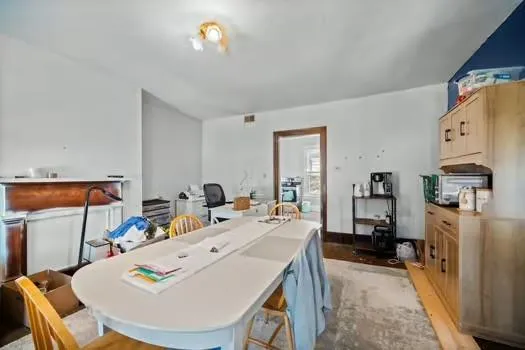 a view of a dining room with furniture