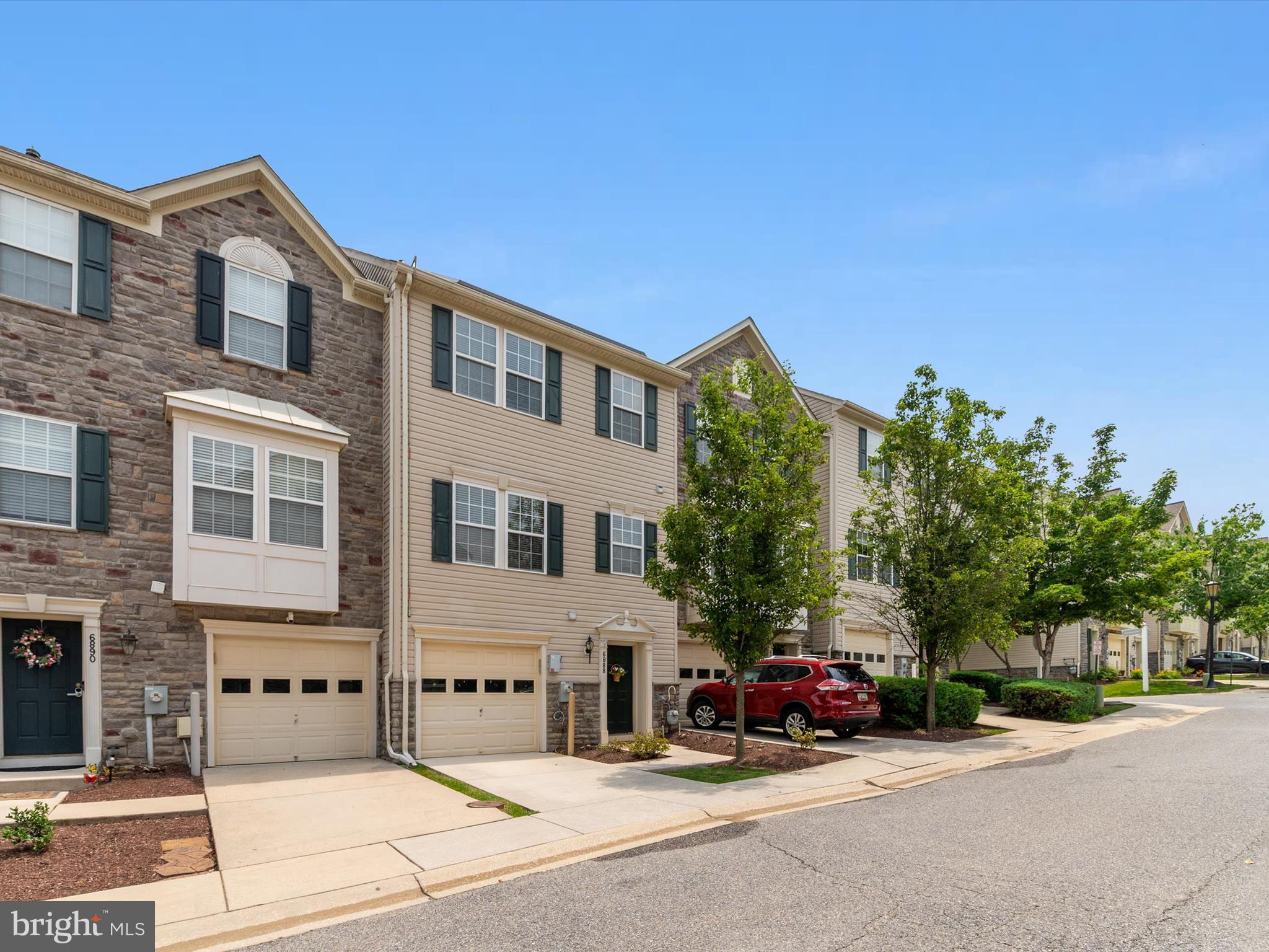 a view of a street with cars
