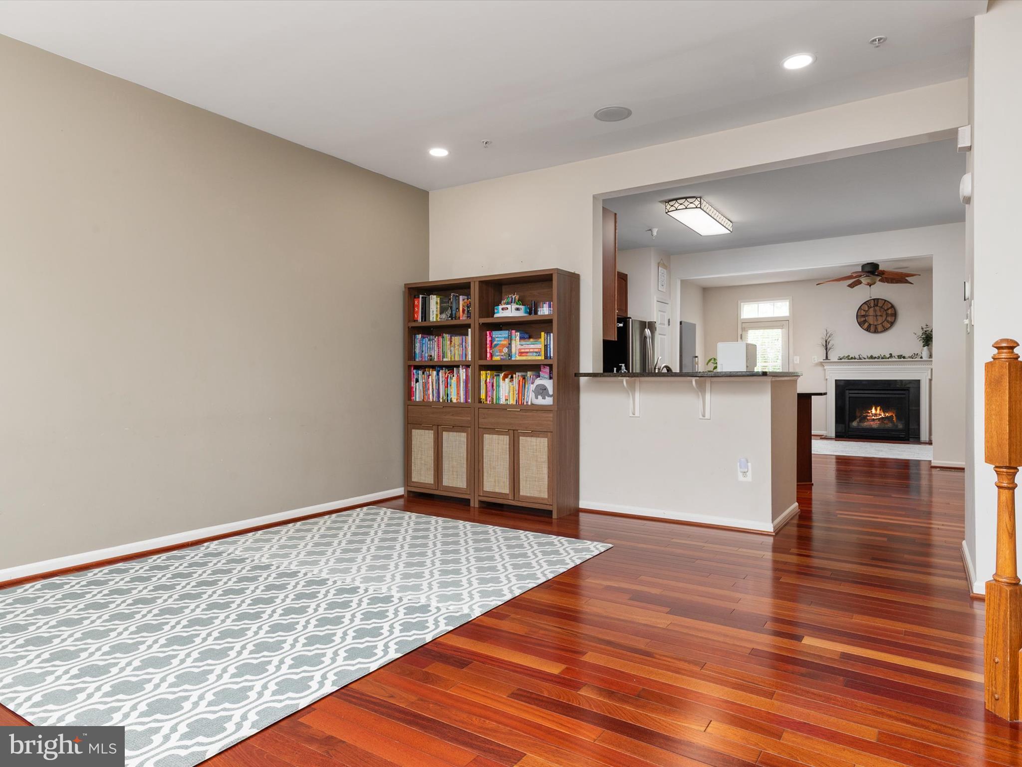 6888 Tasker Falls Elkridge, MD 21075 - Photo 14 of 47 a view of kitchen and hall with wooden floor