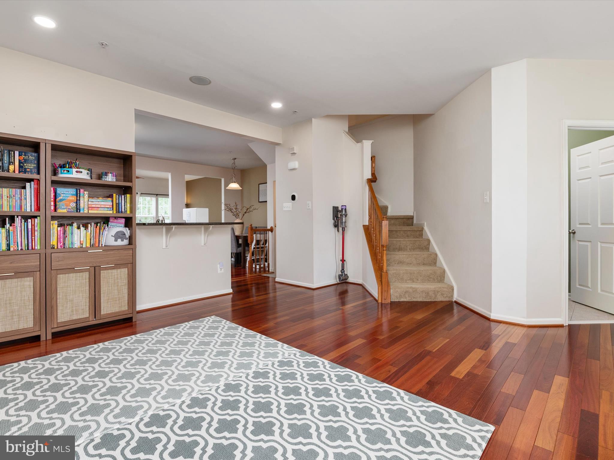 6888 Tasker Falls Elkridge, MD 21075 - Photo 15 of 47 a view of a kitchen with furniture and wooden floor