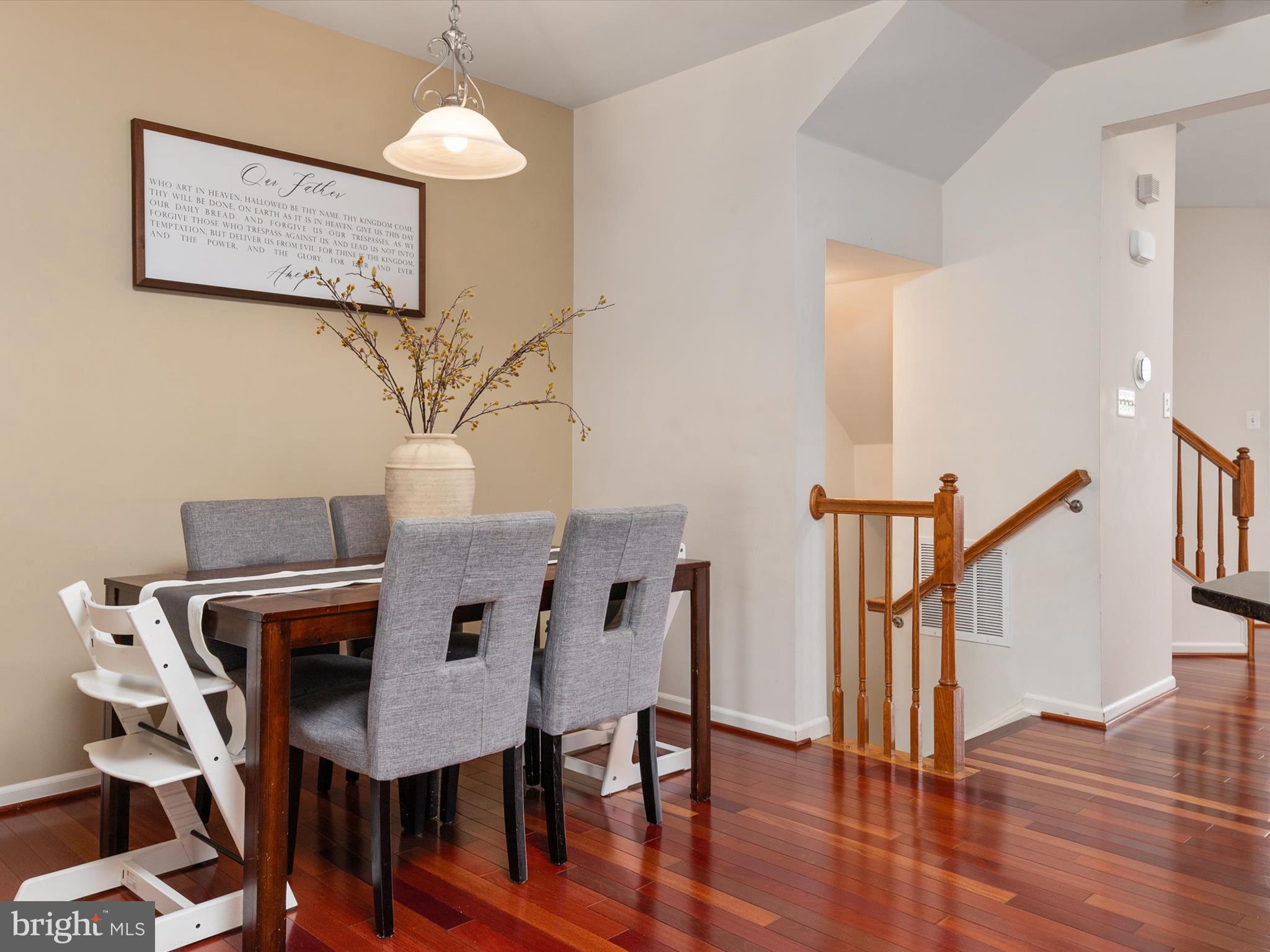 6888 Tasker Falls Elkridge, MD 21075 - Photo 20 of 47 a view of a dining room with furniture and wooden floor