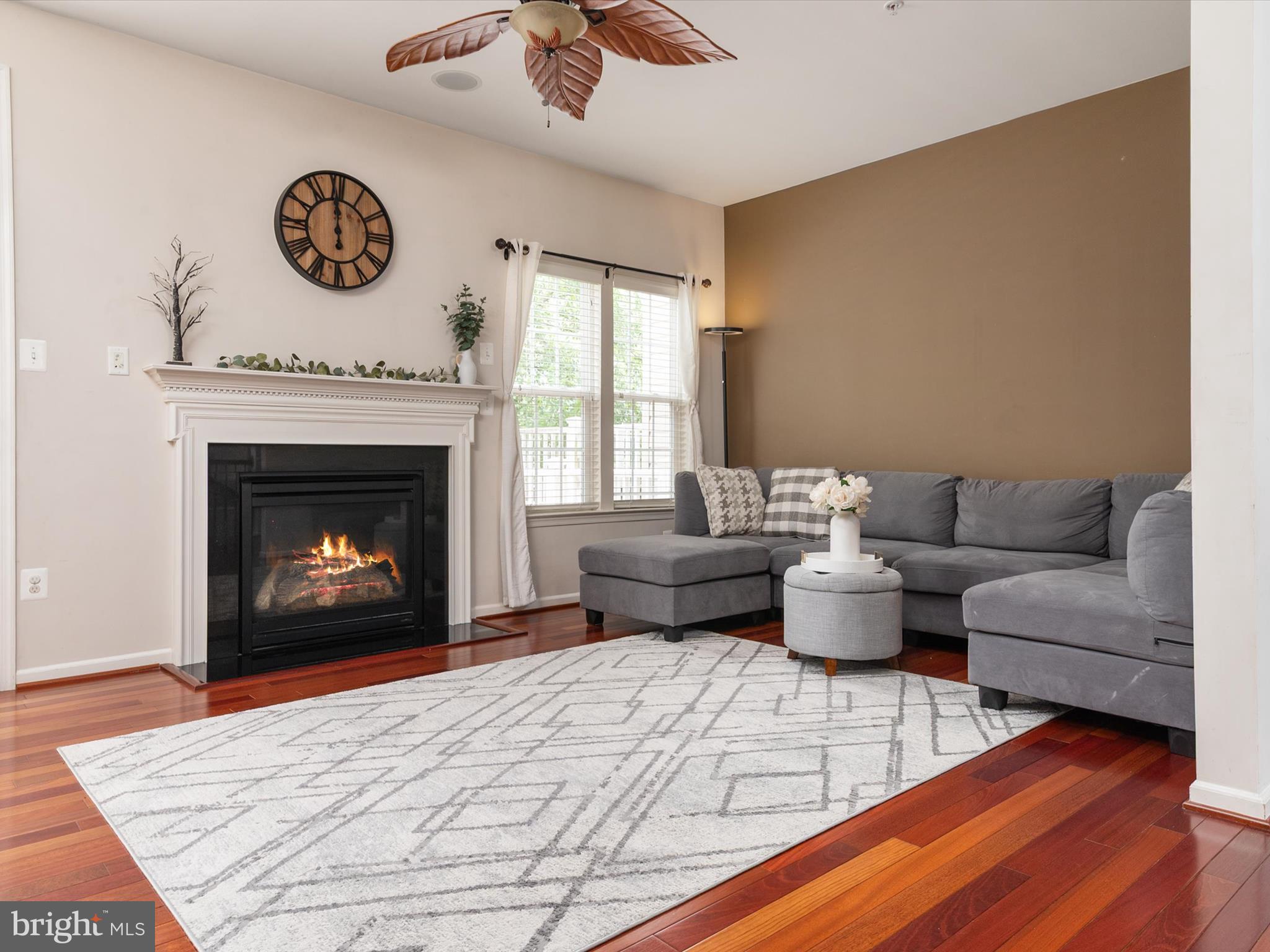 6888 Tasker Falls Elkridge, MD 21075 - Photo 21 of 47 a living room with furniture and a fireplace