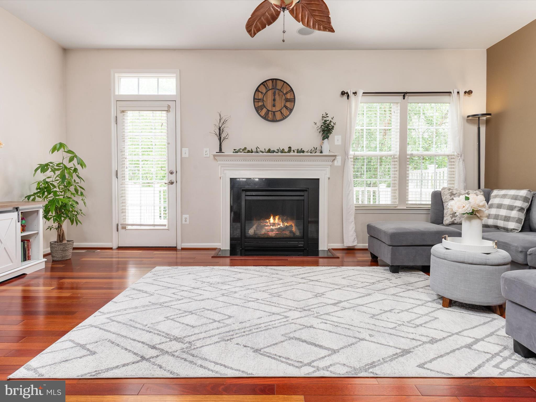 6888 Tasker Falls Elkridge, MD 21075 - Photo 22 of 47 a living room with furniture and a fireplace