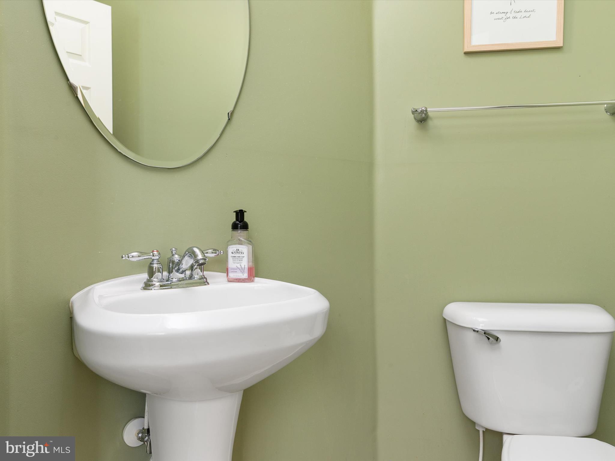 6888 Tasker Falls Elkridge, MD 21075 - Photo 24 of 47 a bathroom with a sink and a mirror