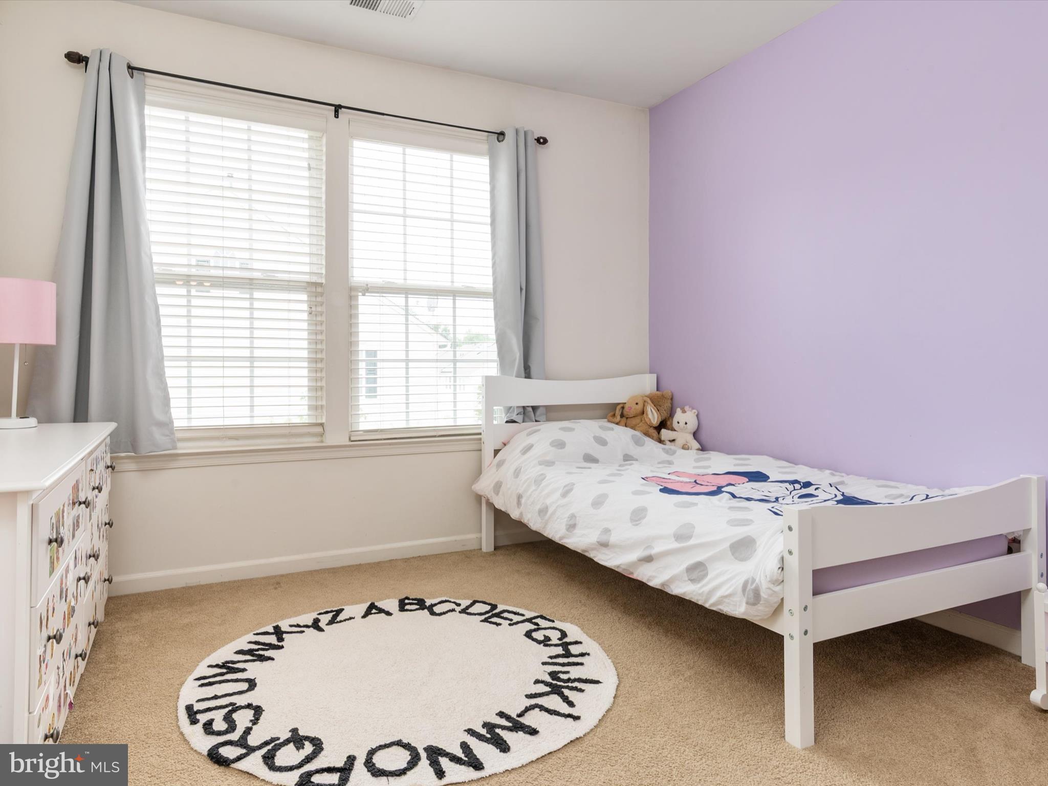 6888 Tasker Falls Elkridge, MD 21075 - Photo 32 of 47 a bedroom with a bed and a window