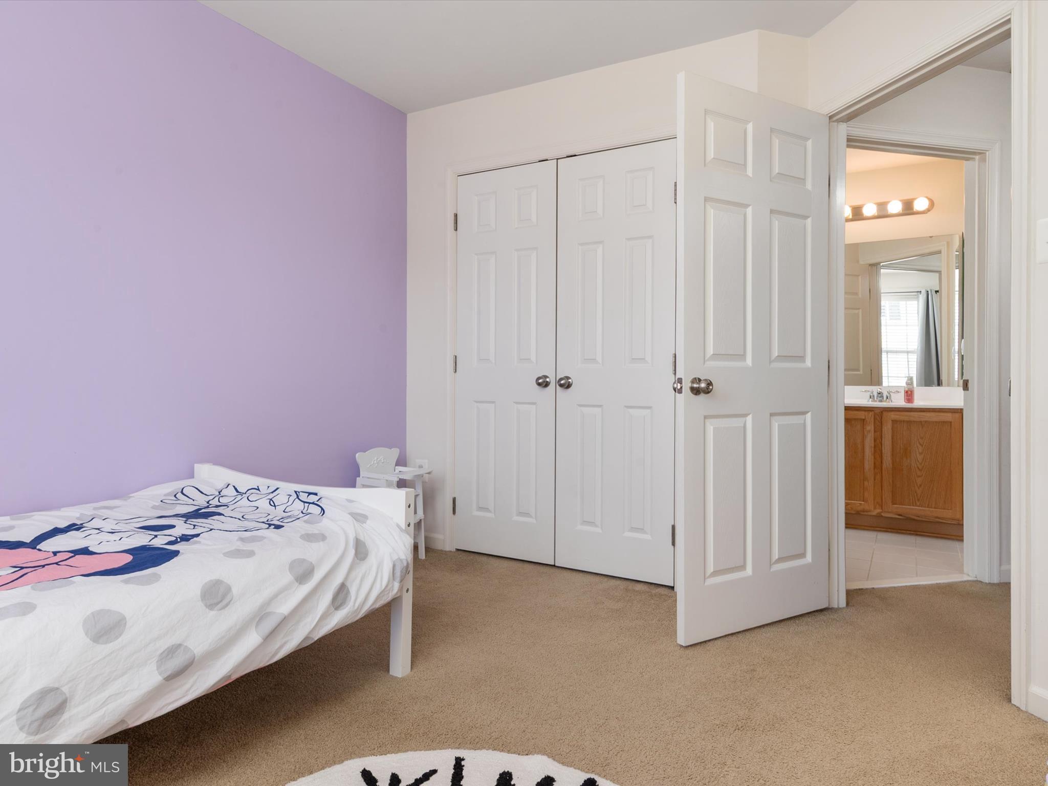 6888 Tasker Falls Elkridge, MD 21075 - Photo 33 of 47 a bedroom with a bed and hallway